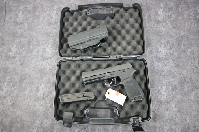 59:  Sig Sauer Model P320 in 9 MM with 4.7